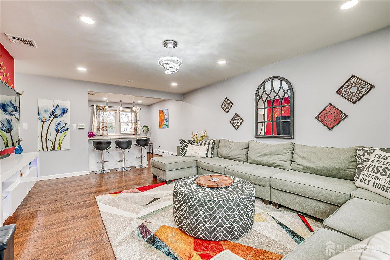149 Vineyard Road Edison, NJ 08817 - Photo 6 of 40 a living room with furniture and a large window
