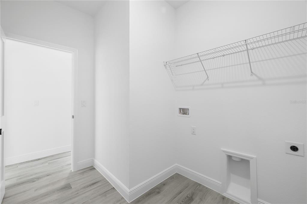 2640 West Fairway Loop Citrus Springs, FL 34434 - Photo 32 of 39 a view of a room with wooden floor