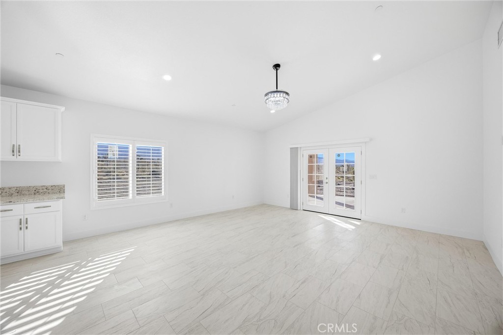 11788 Buckwheat Road Pinon Hills, CA 92371 - Photo 15 of 61 a view of an empty room with a window