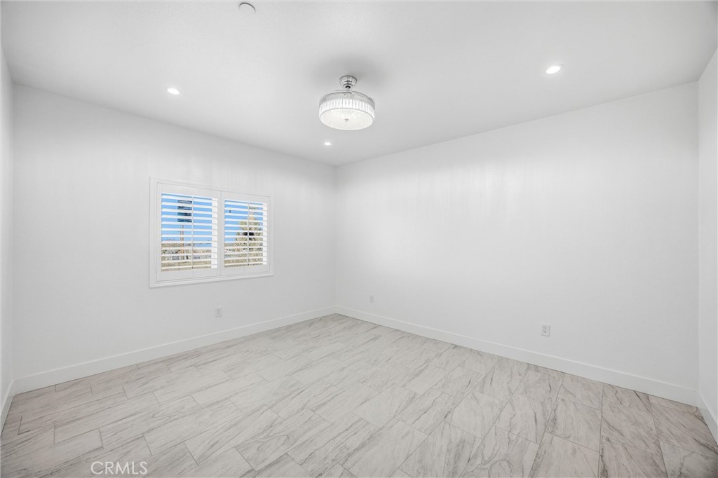 11788 Buckwheat Road Pinon Hills, CA 92371 - Photo 24 of 61 an empty room with a window