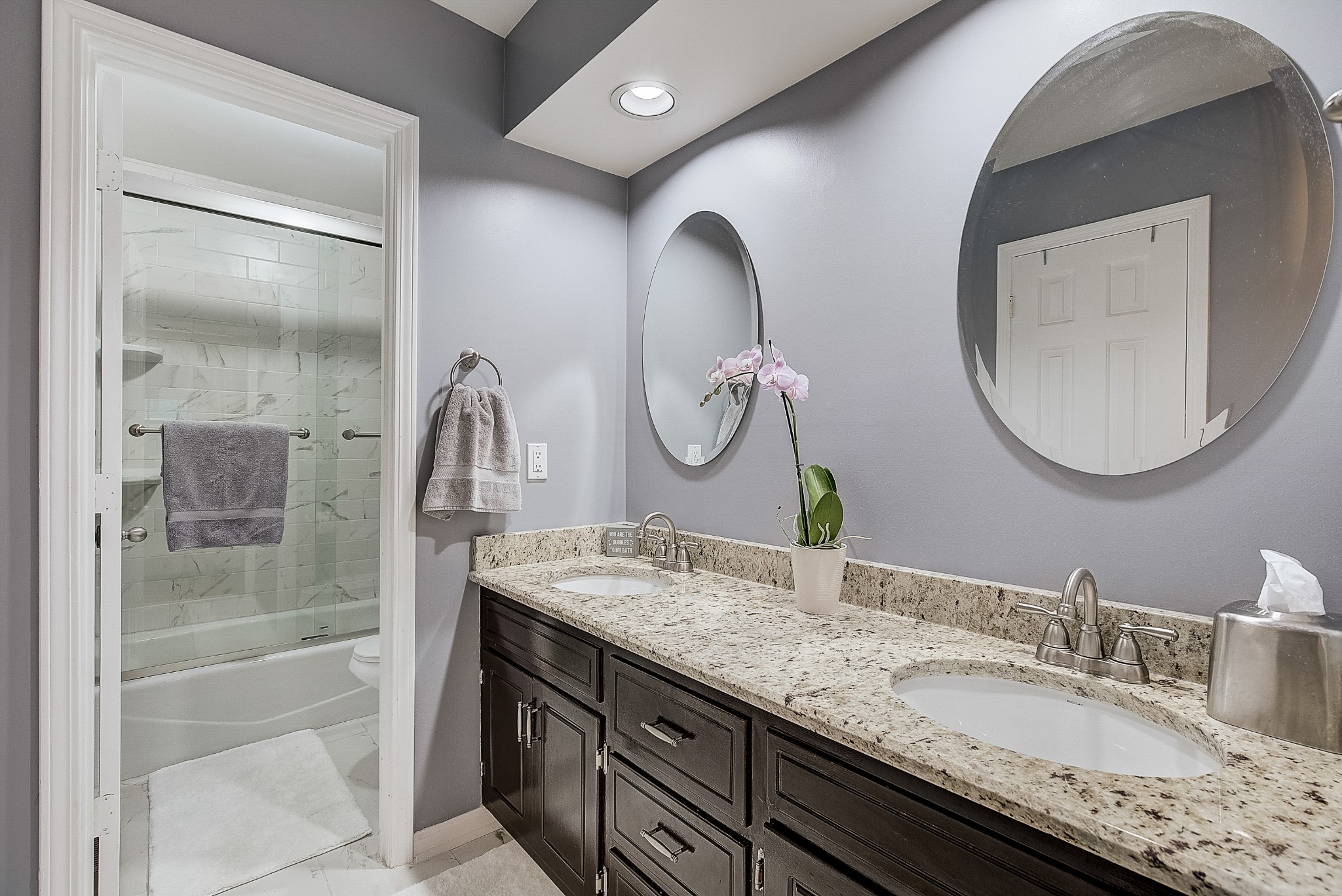 1284 General George Patton Road Nashville, TN 37221 - Photo 18 of 30 a bathroom with a granite countertop double vanity sinks and a mirror
