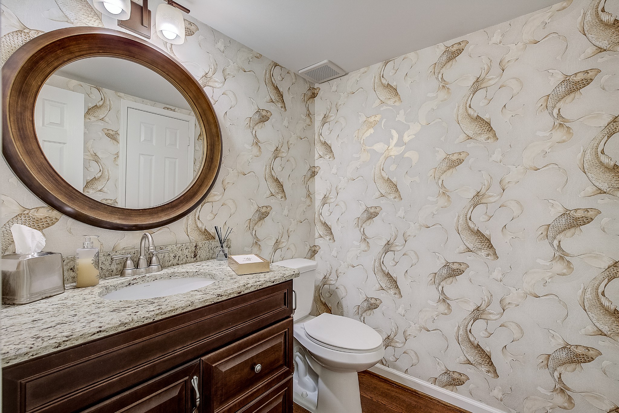 1284 General George Patton Road Nashville, TN 37221 - Photo 27 of 30 a bathroom with a granite countertop sink and a mirror