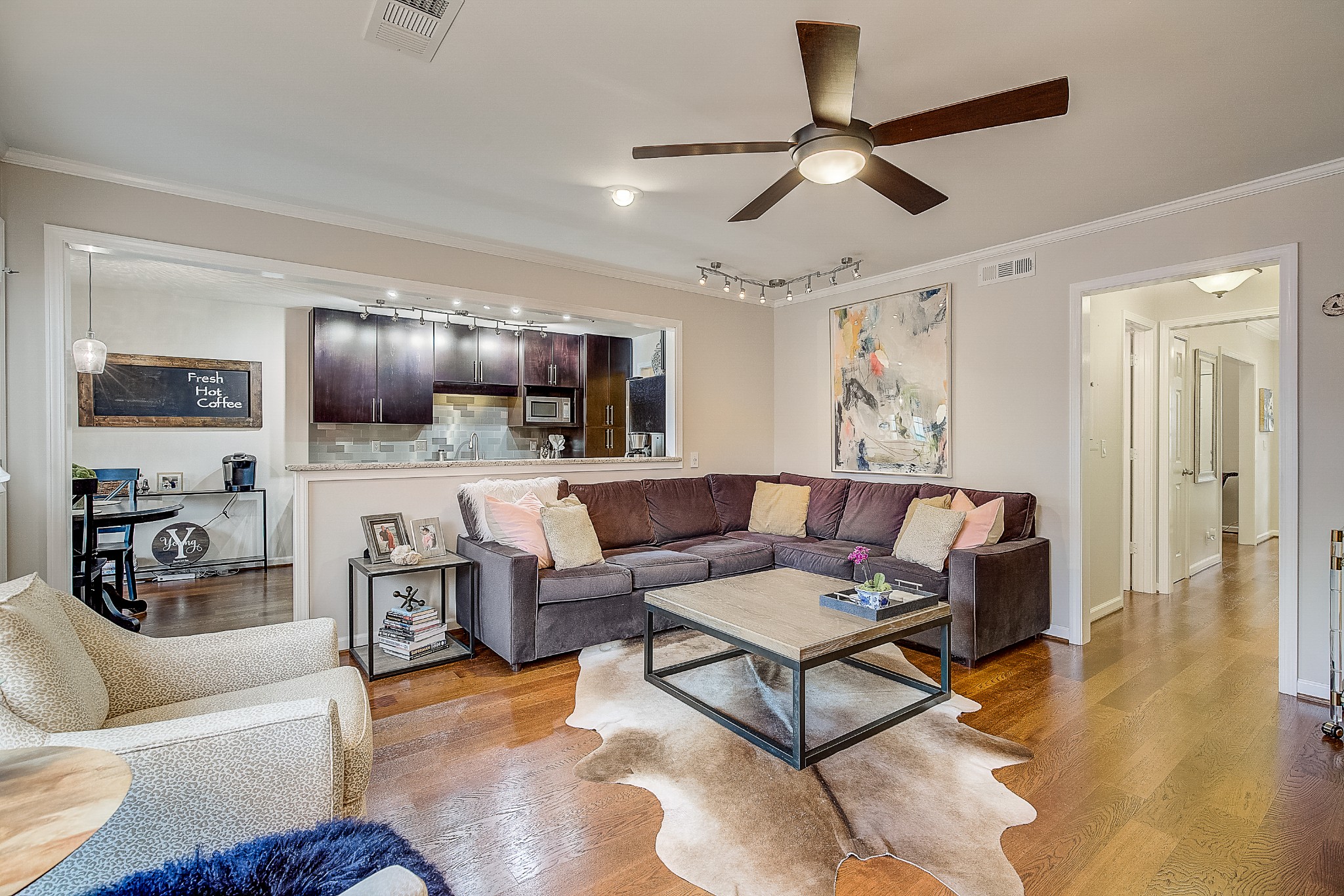 1284 General George Patton Road Nashville, TN 37221 - Photo 9 of 30 a living room with furniture kitchen view and a wooden floor
