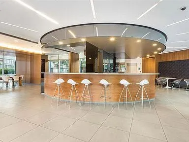 a room with lots of tables and chairs