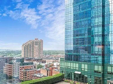 a view of a city with tall buildings