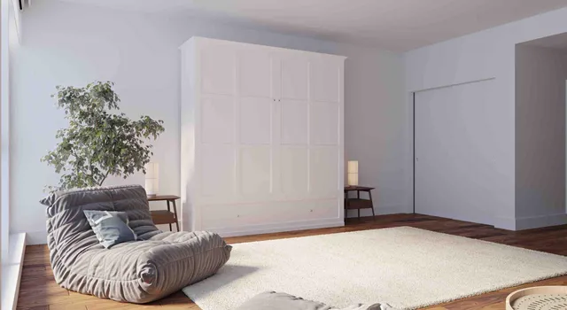 a bedroom with a bed and a couch