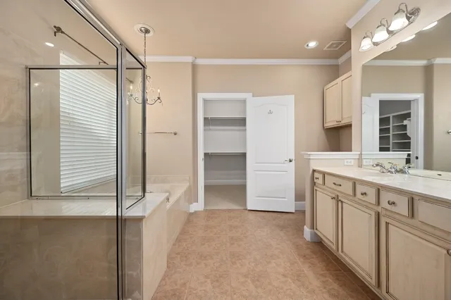 a bathroom with a double vanity sink mirror and double