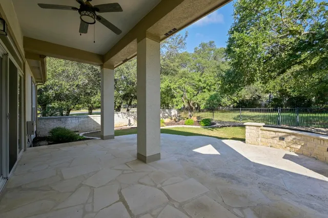 a view of a swimming pool with a porch