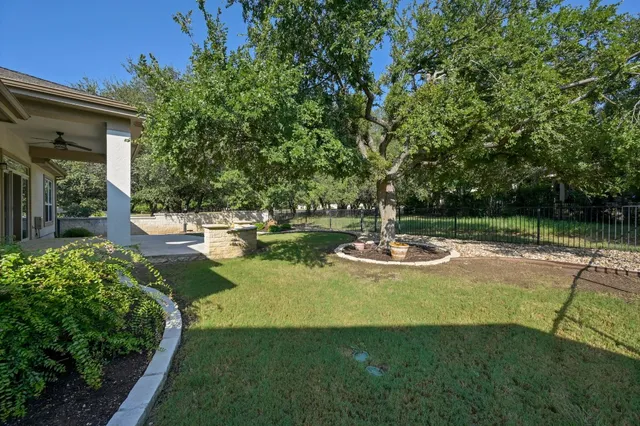 a view of a swimming pool with a garden