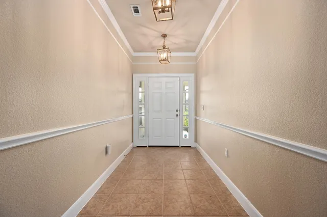 a view of hallway with stairs