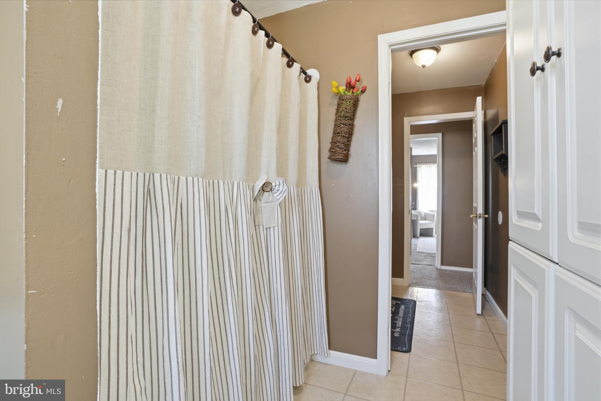 118 West Clinton Street Clayton, NJ 08312 - Photo 20 of 30 a view of a bathroom from the hallway