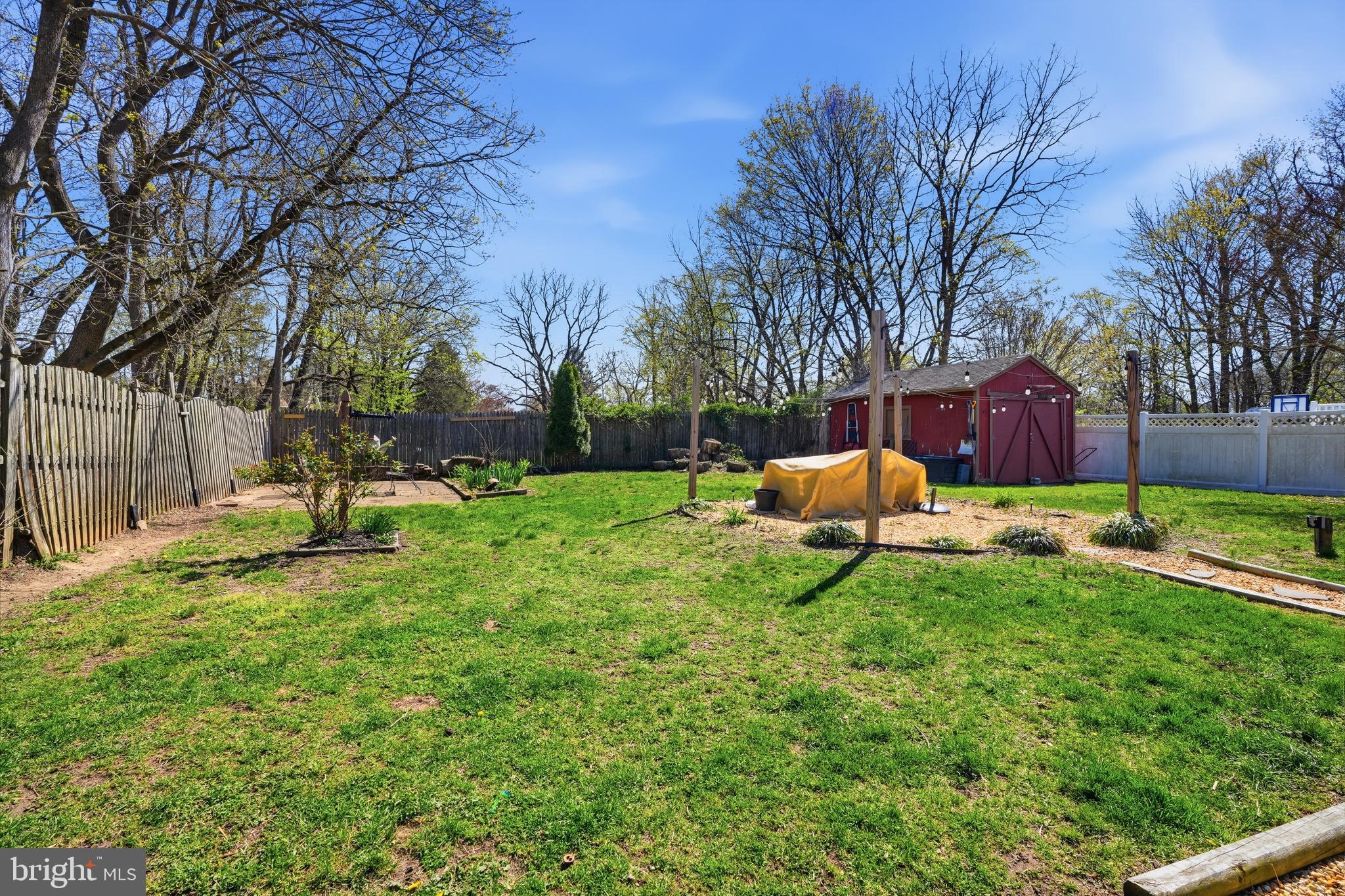 118 West Clinton Street Clayton, NJ 08312 - Photo 25 of 30 a backyard of a house with table and chairs