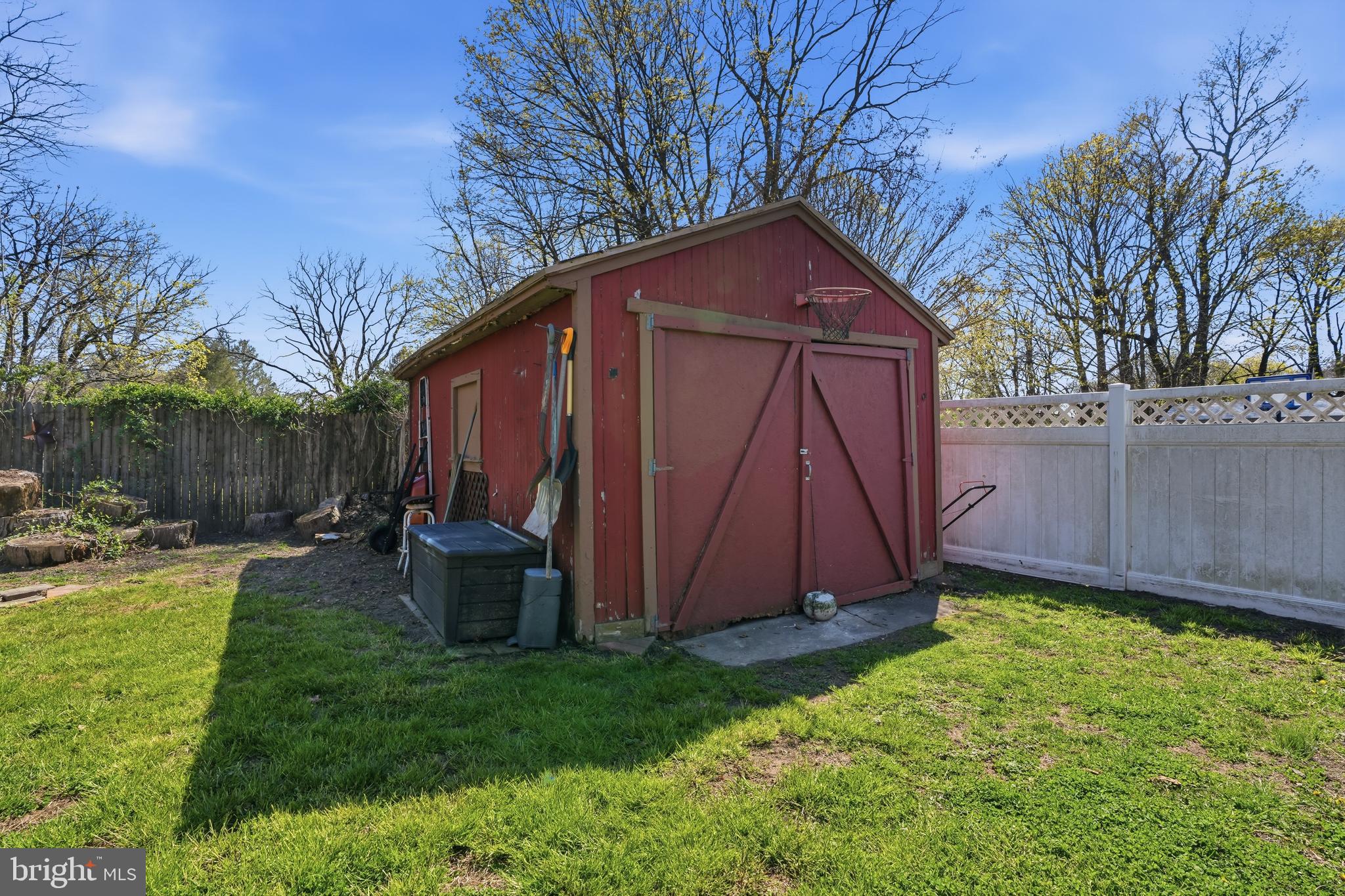 118 West Clinton Street Clayton, NJ 08312 - Photo 27 of 30 a view of backyard with tub and trees