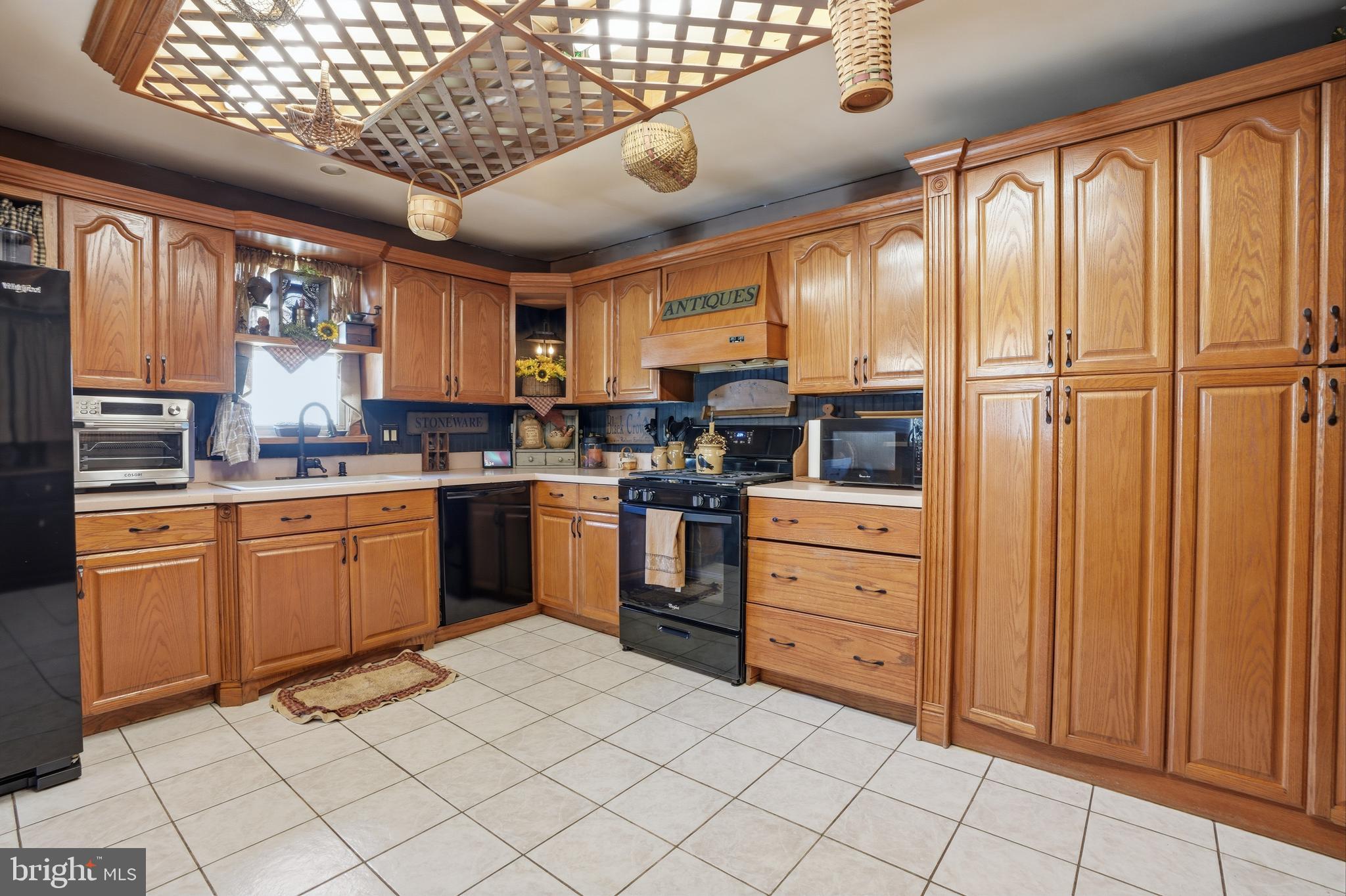 118 West Clinton Street Clayton, NJ 08312 - Photo 6 of 30 a kitchen with white cabinets and white appliances