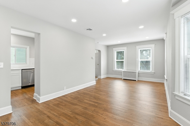 45 Oakridge Road West Orange, NJ 07052 - Photo 12 of 35 an empty room with wooden floor and windows