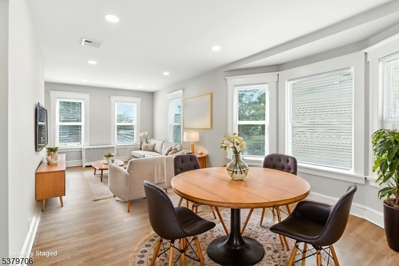 45 Oakridge Road West Orange, NJ 07052 - Photo 13 of 35 a view of a dining room with furniture and wooden floor