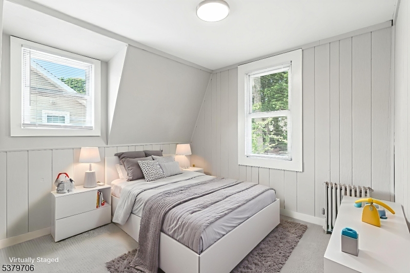 45 Oakridge Road West Orange, NJ 07052 - Photo 18 of 35 a bedroom with a bed and a window