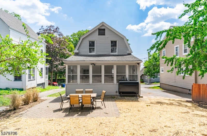 45 Oakridge Road West Orange, NJ 07052 - Photo 35 of 35 a front view of a house with a yard and sitting area