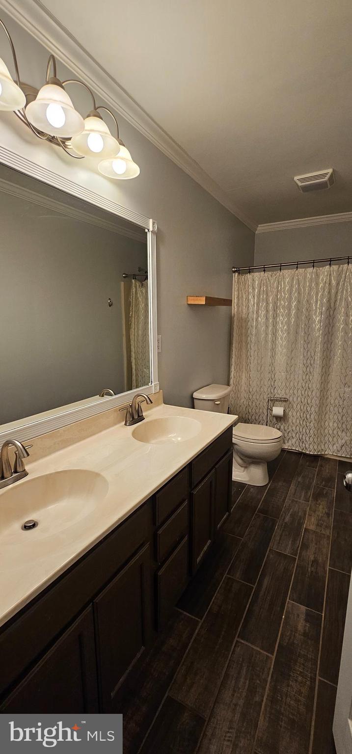 4078 Panhandle Road Front Royal, VA 22630 - Photo 14 of 23 a bathroom with a sink and a mirror