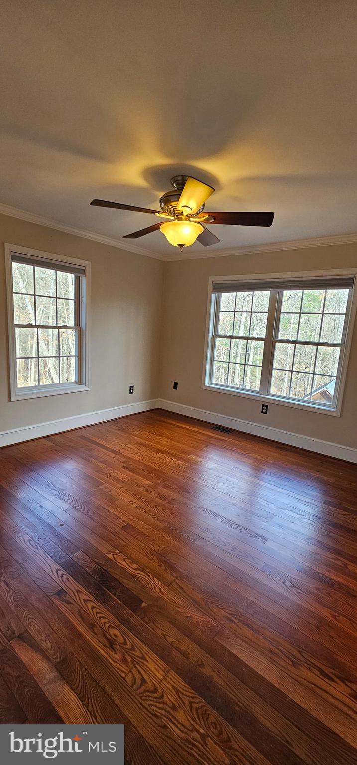 4078 Panhandle Road Front Royal, VA 22630 - Photo 7 of 23 wooden floor in an empty room with a window