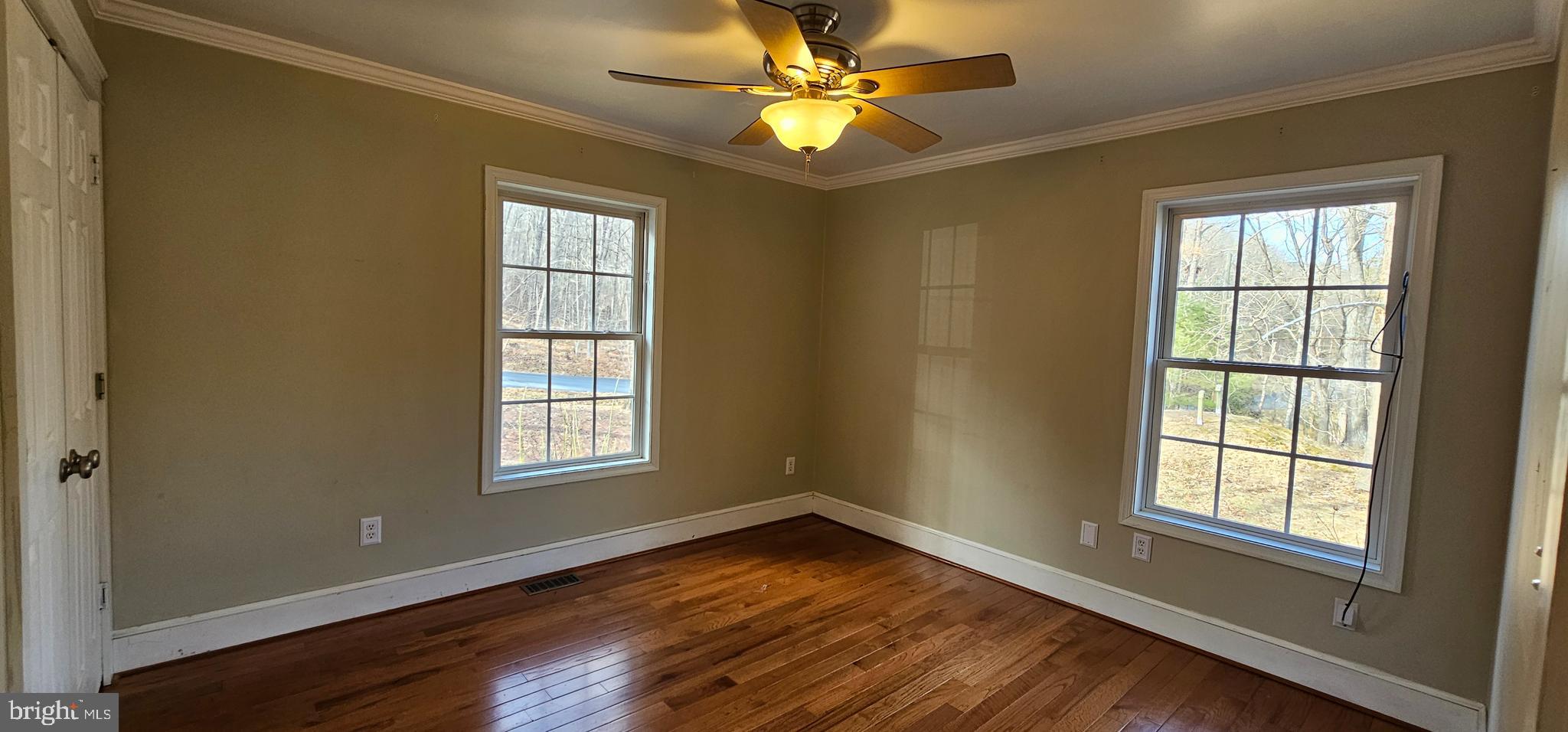 4078 Panhandle Road Front Royal, VA 22630 - Photo 10 of 23 wooden floor in an empty room with a window