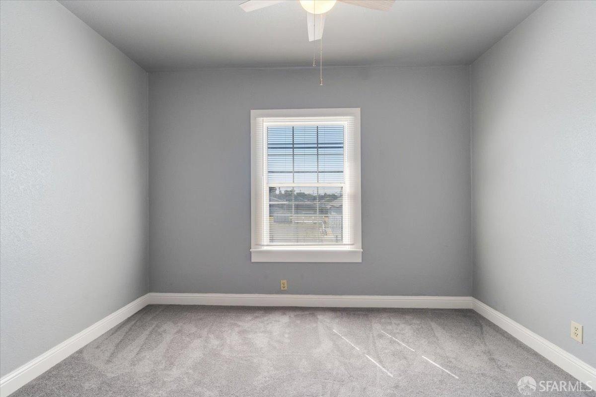 1309 80th Avenue Oakland, CA 94621 - Photo 14 of 75 an empty room with a window