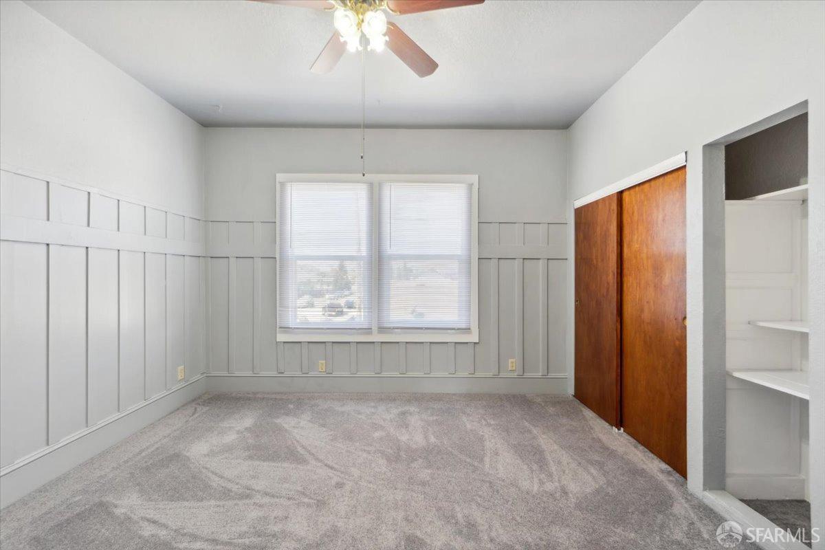 1309 80th Avenue Oakland, CA 94621 - Photo 19 of 75 a view of an empty room with a window