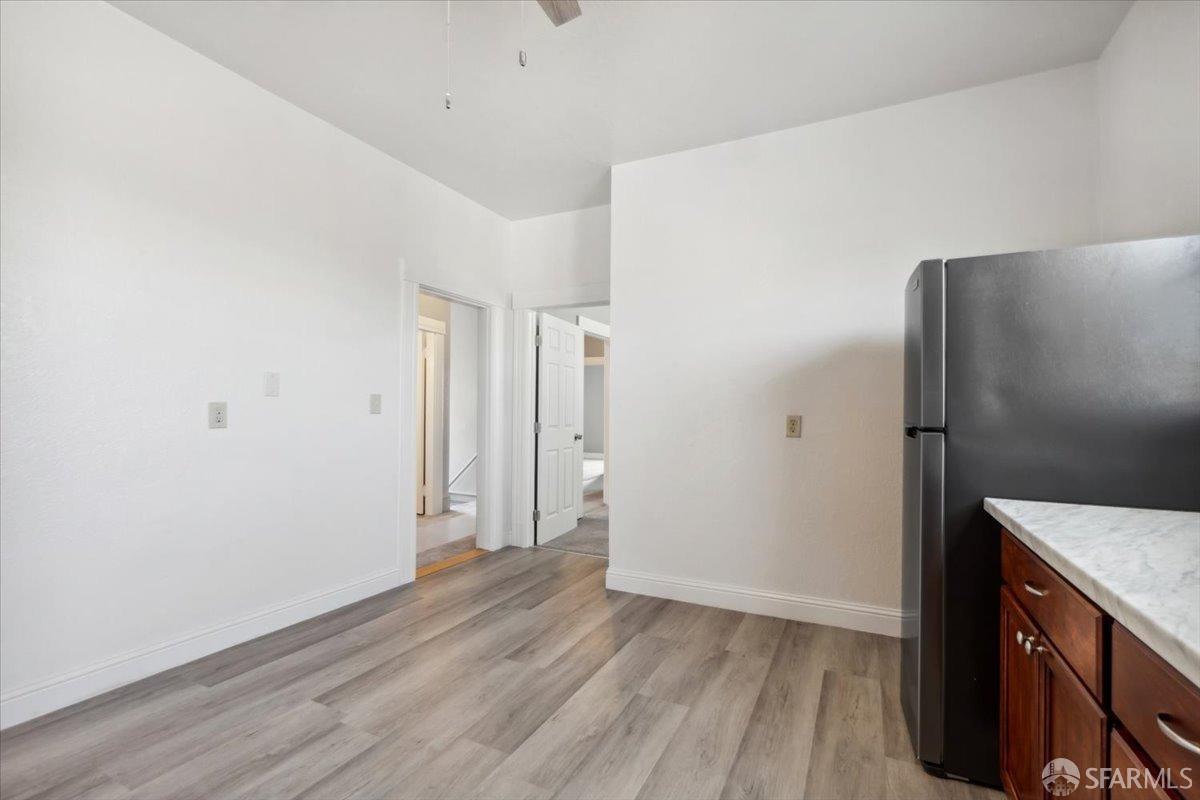 1309 80th Avenue Oakland, CA 94621 - Photo 32 of 75 a view of walk in closet with wooden floor