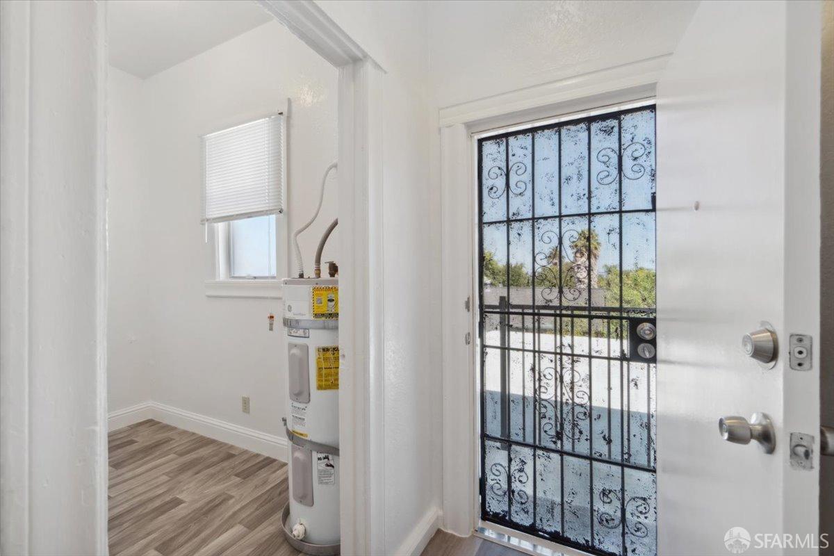 1309 80th Avenue Oakland, CA 94621 - Photo 33 of 75 a view of an entryway with wooden floor