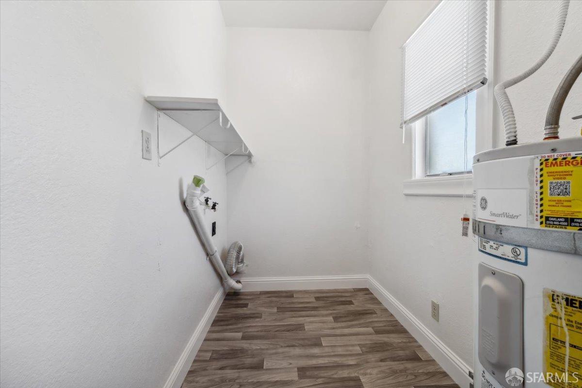 1309 80th Avenue Oakland, CA 94621 - Photo 34 of 75 a view of entryway and hall with wooden floor