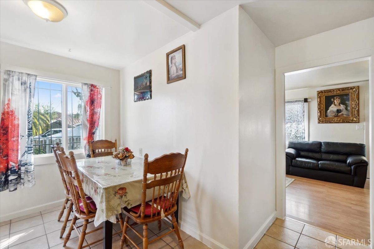 1309 80th Avenue Oakland, CA 94621 - Photo 41 of 75 a view of a livingroom with furniture and a window