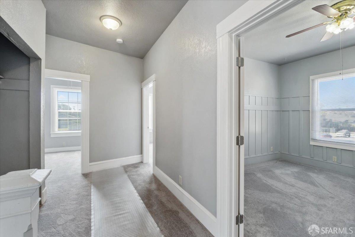 1309 80th Avenue Oakland, CA 94621 - Photo 9 of 75 a view of livingroom with furniture and windows