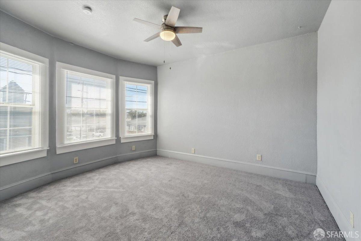 1309 80th Avenue Oakland, CA 94621 - Photo 10 of 75 a view of an empty room with a window