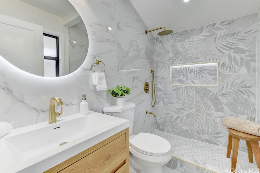 1159 Loho Street Kailua, HI 96734 - Photo 11 of 25 a bathroom with a sink a toilet and shower