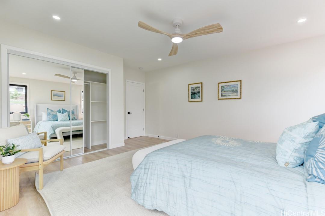 1159 Loho Street Kailua, HI 96734 - Photo 16 of 25 a spacious bedroom with a bed and a view of livingroom