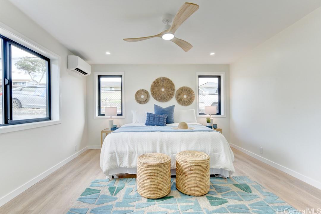 1159 Loho Street Kailua, HI 96734 - Photo 17 of 25 a bed room with a bed and window