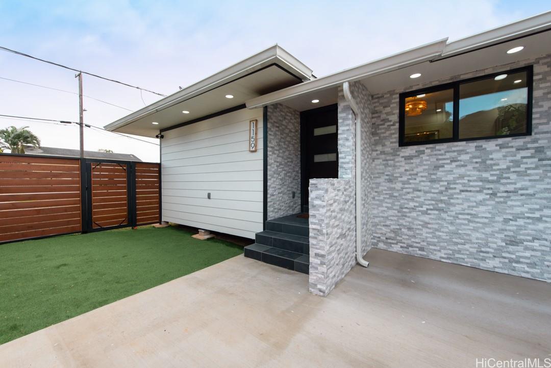 1159 Loho Street Kailua, HI 96734 - Photo 3 of 25 a view of a house with garage
