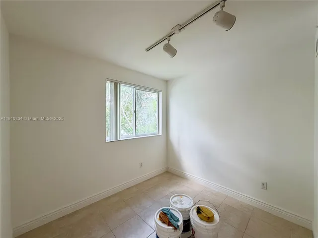 a view of parking space with windows
