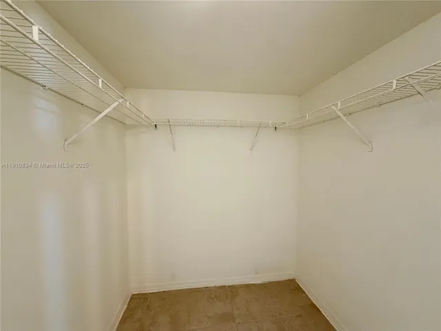 a kitchen with a refrigerator a sink and dishwasher