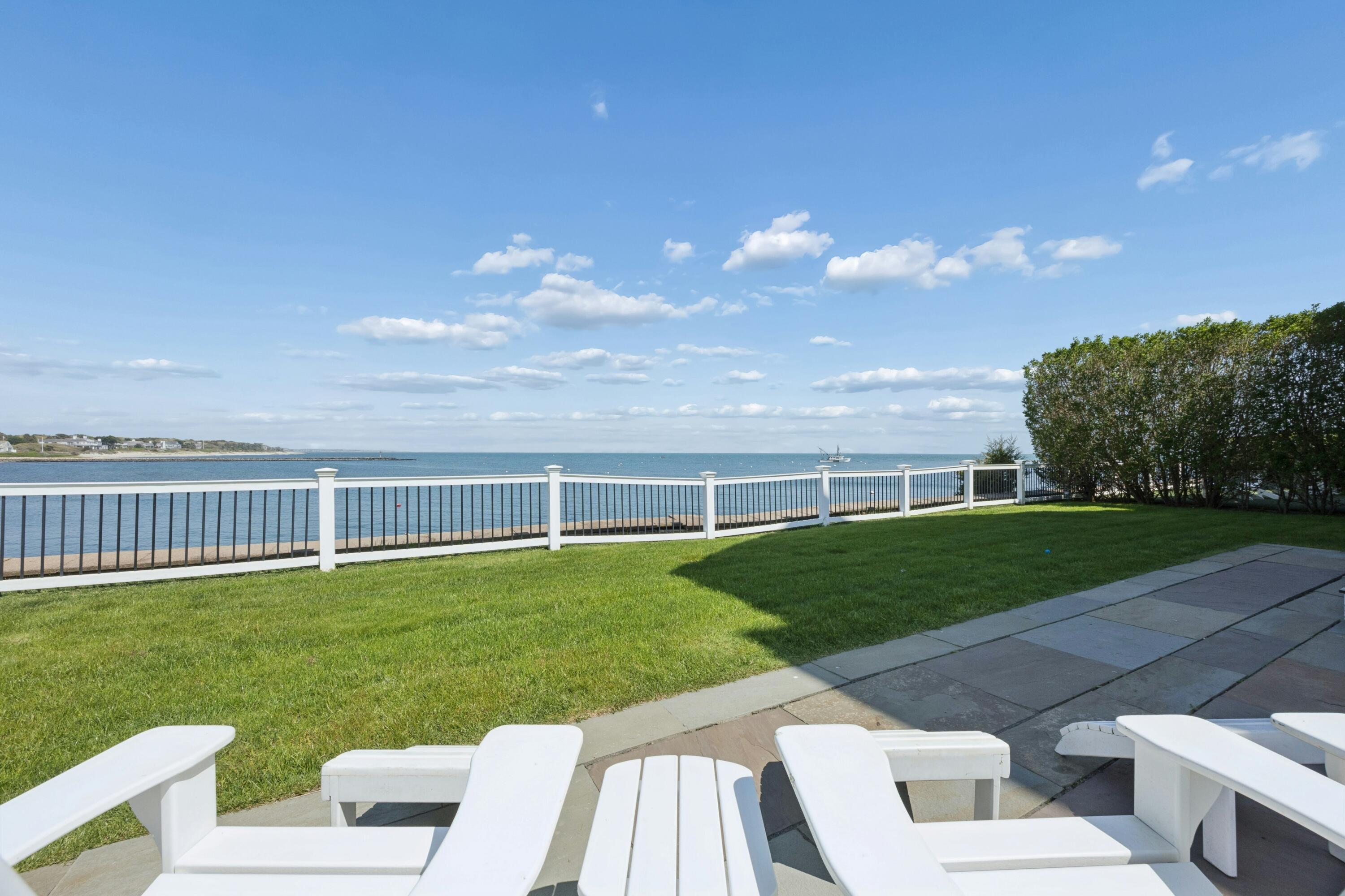 23 Snow Inn Road, Unit 7 Harwich Port, MA 02646 - Photo 8 of 37 a view of a garden with lawn chairs