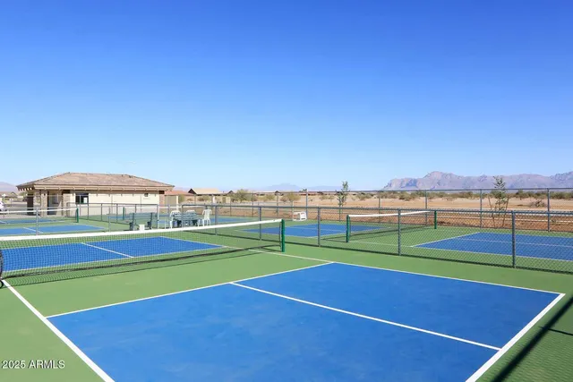 a view of a swimming pool with a patio