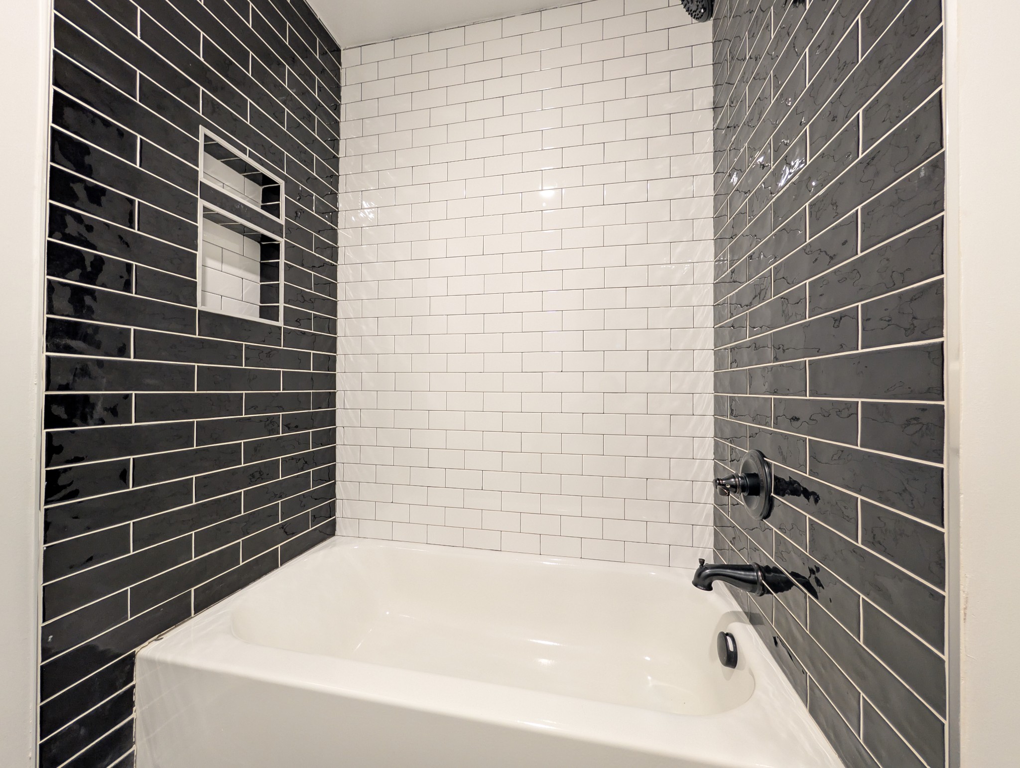 244 Warrior Road Madison, TN 37115 - Photo 12 of 24 a bathroom with a bathtub