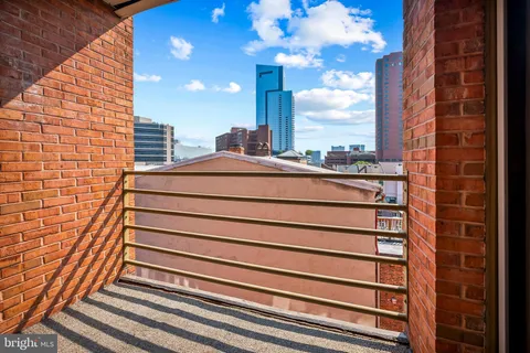 a view of a building from a balcony