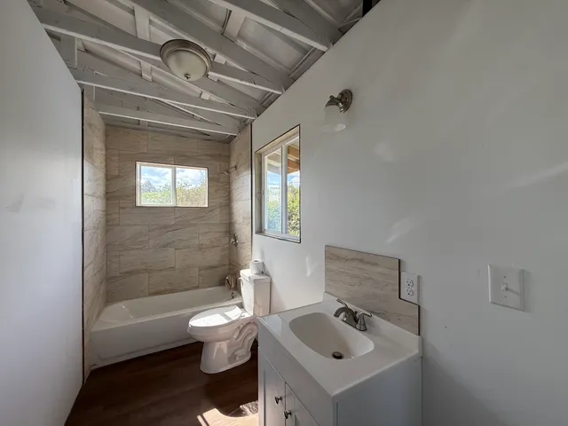 a backyard of a house with lots of green space