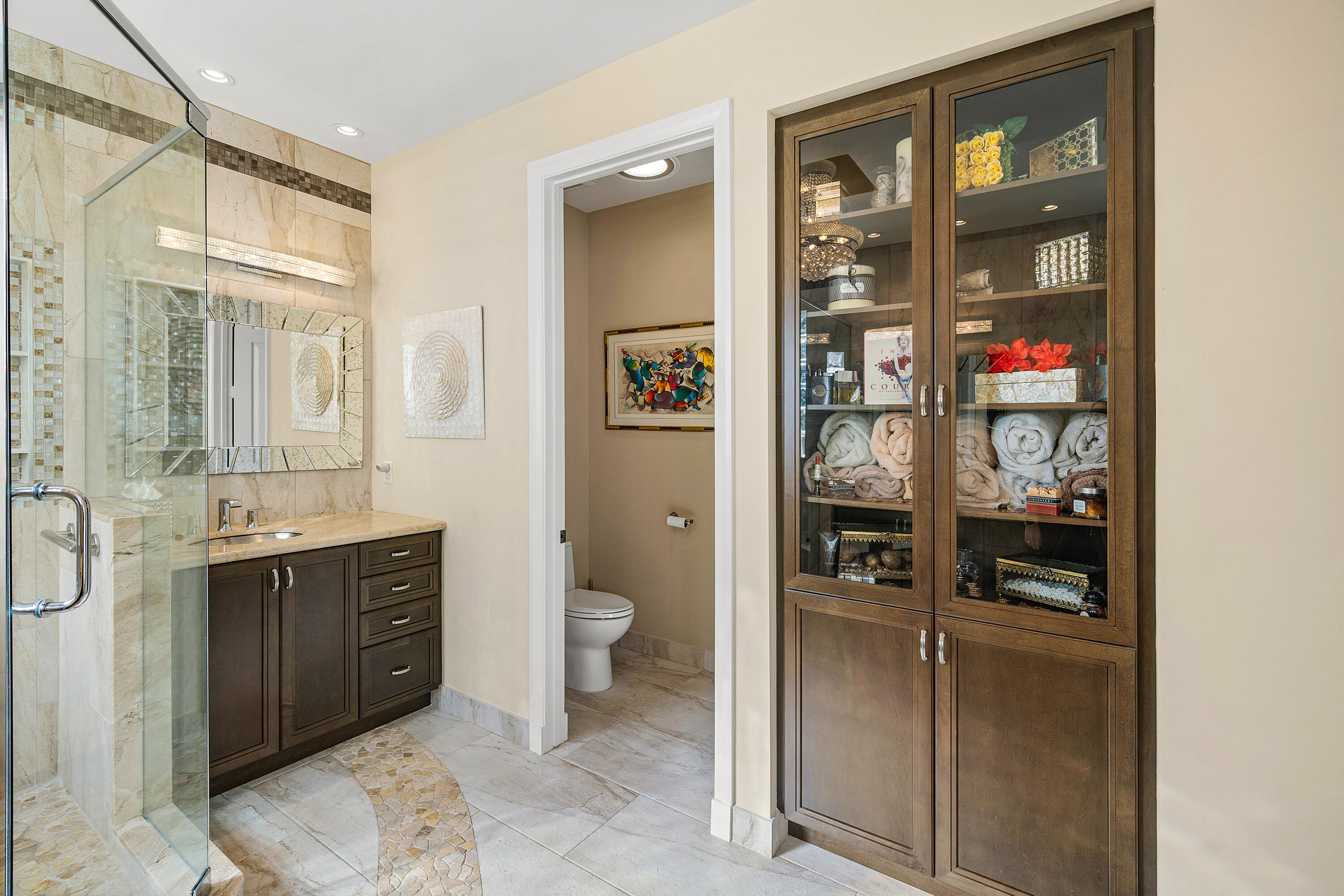 13506 Shell Beach Court Delray Beach, FL 33446 - Photo 32 of 66 a en suite bathroom with a granite countertop sink a toilet and a shower