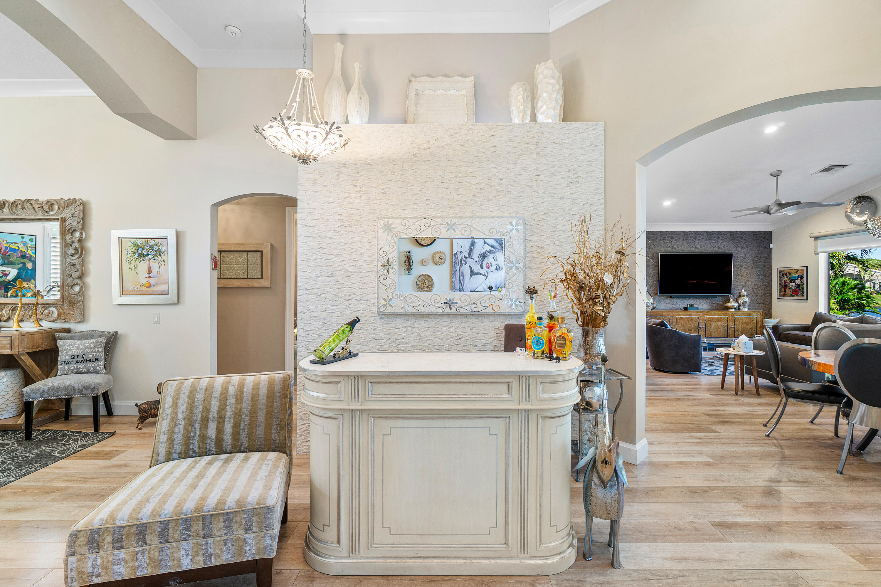 13506 Shell Beach Court Delray Beach, FL 33446 - Photo 10 of 66 a living room with furniture and a chandelier