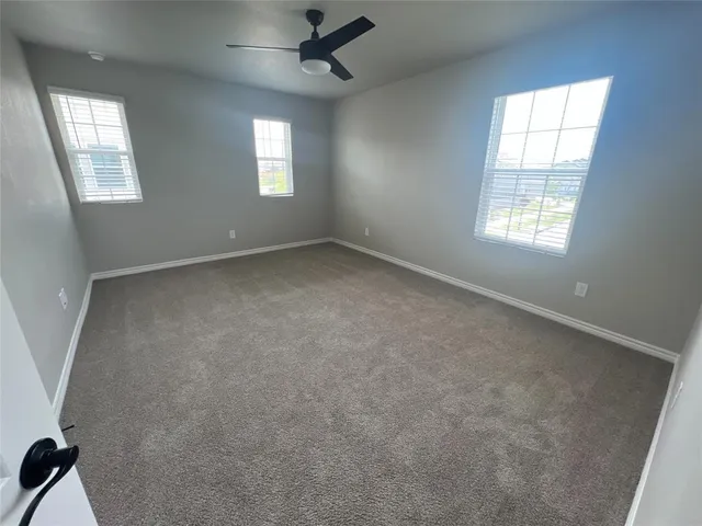 an empty room that has a window