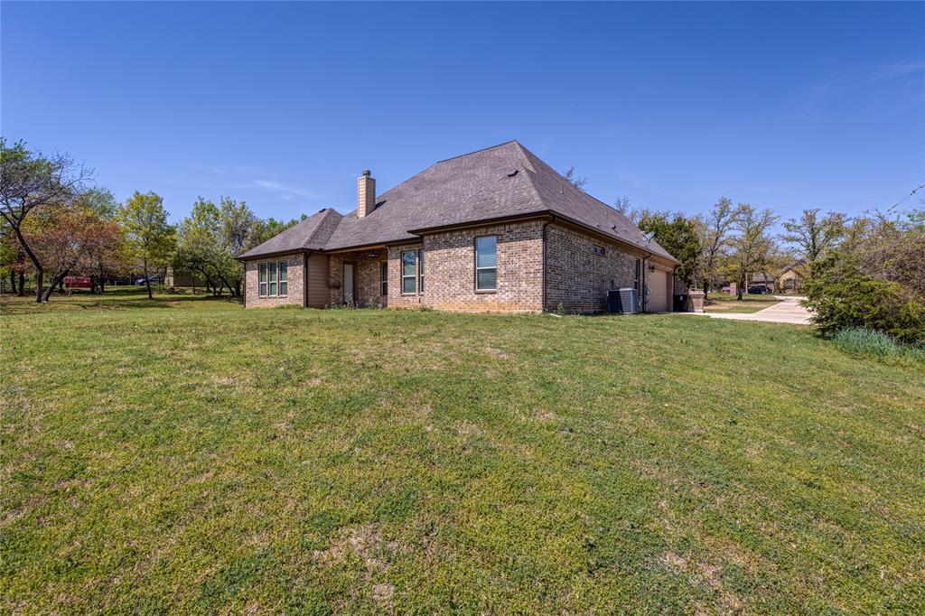 143 Wrigley Drive Springtown, TX 76082 - Photo 35 of 38 Large backyard, perfect for future workshop and-or pool