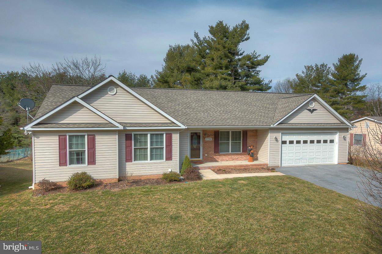 3726 Grave Run Road Hampstead, MD 21074 - Photo 1 of 30 a front view of a house with garden