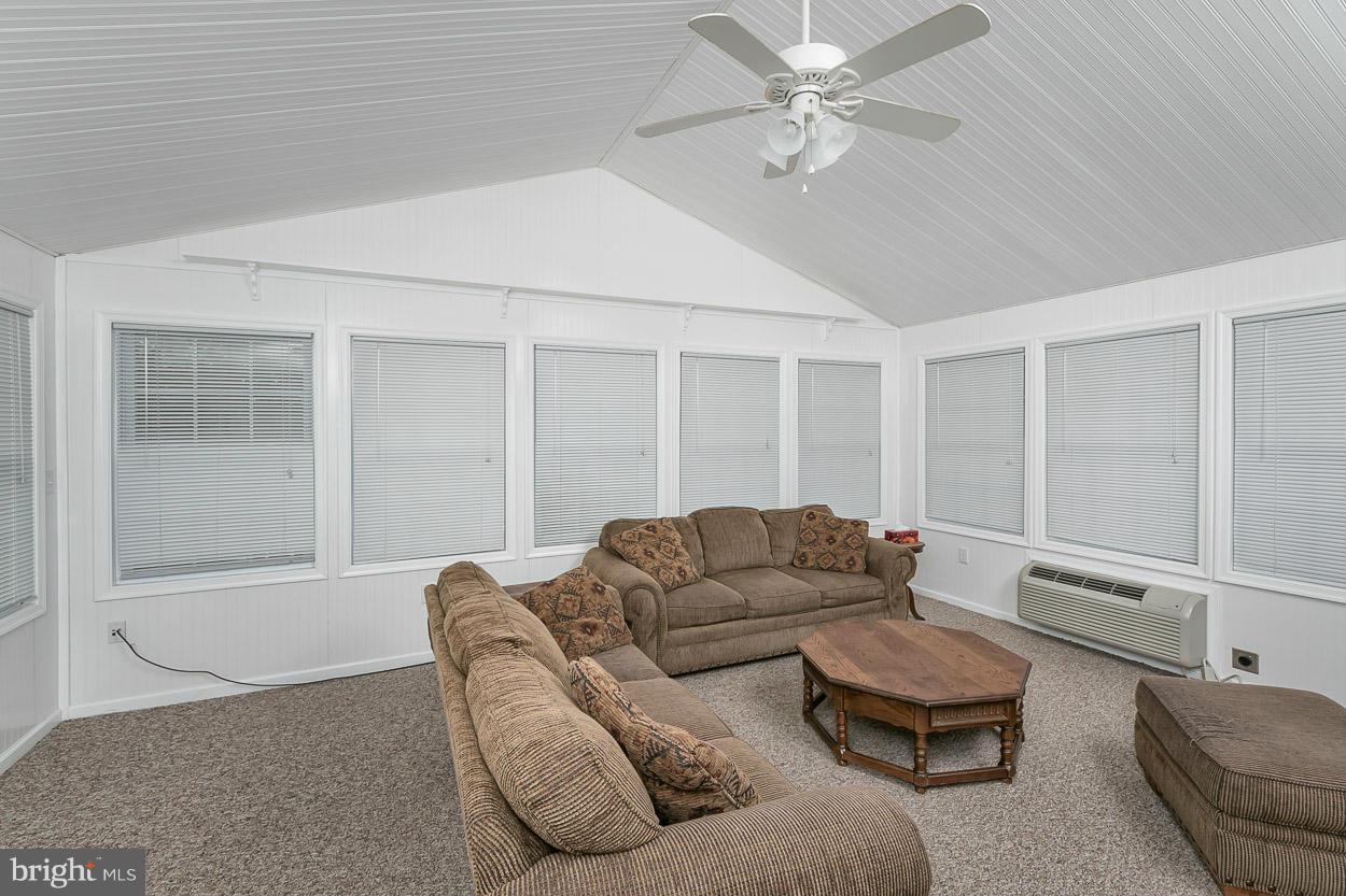 3726 Grave Run Road Hampstead, MD 21074 - Photo 14 of 30 a living room with furniture and a ceiling fan